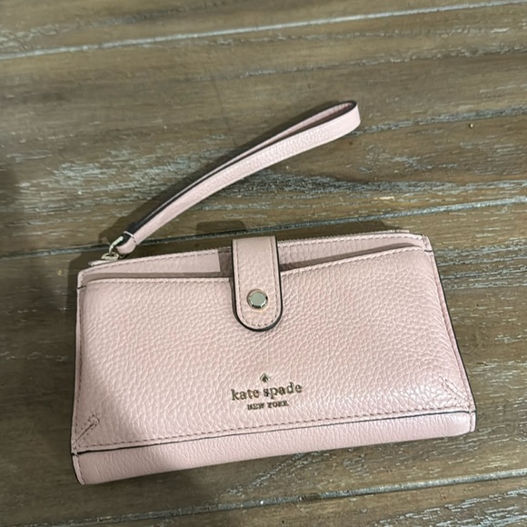 kate spade Handbags - Final Sale❤️Kate Spade New York medium size wristlet in pink. Mint condition.